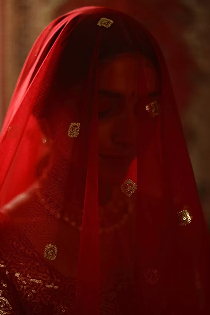 Sublime Red Sequins Embroidered Net Semi Stitched Bridal Lehenga