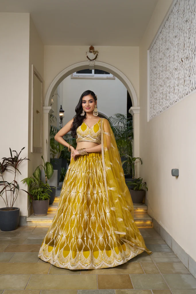 Mustard Yellow Elegant Butterfly Net Lehenga with Intricate Embroidery